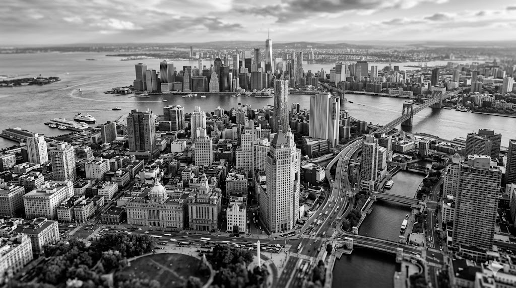 Black and white aerial view of a dense city